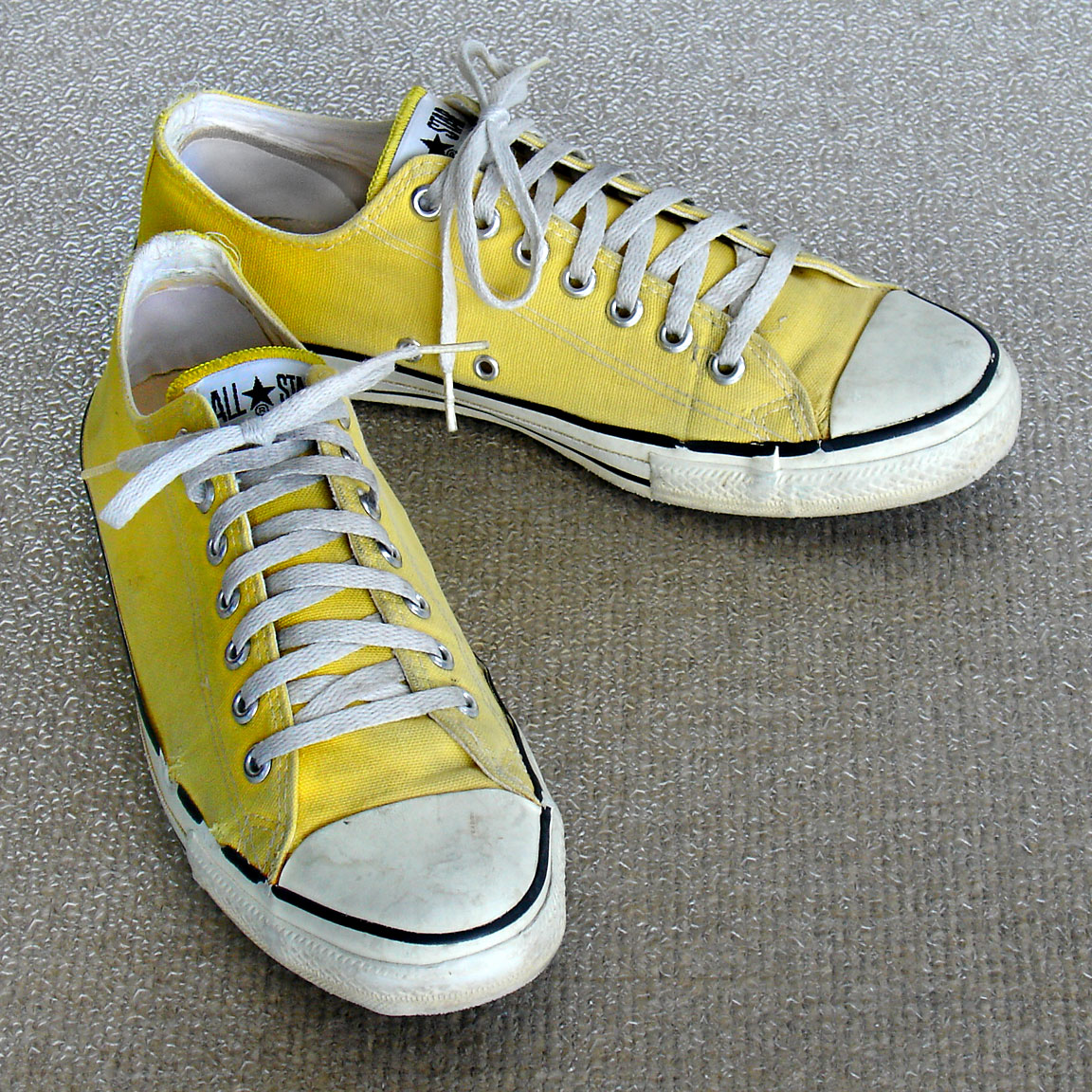 Vintage yellow American-made Converse All Star Chuck Taylor shoes for sale at http://www.collectornet.net/shoes